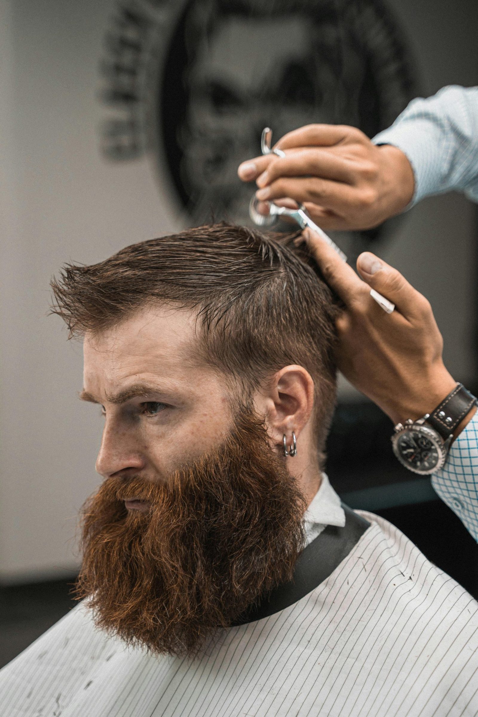Hawk & Fade barber giving a client a precision fade